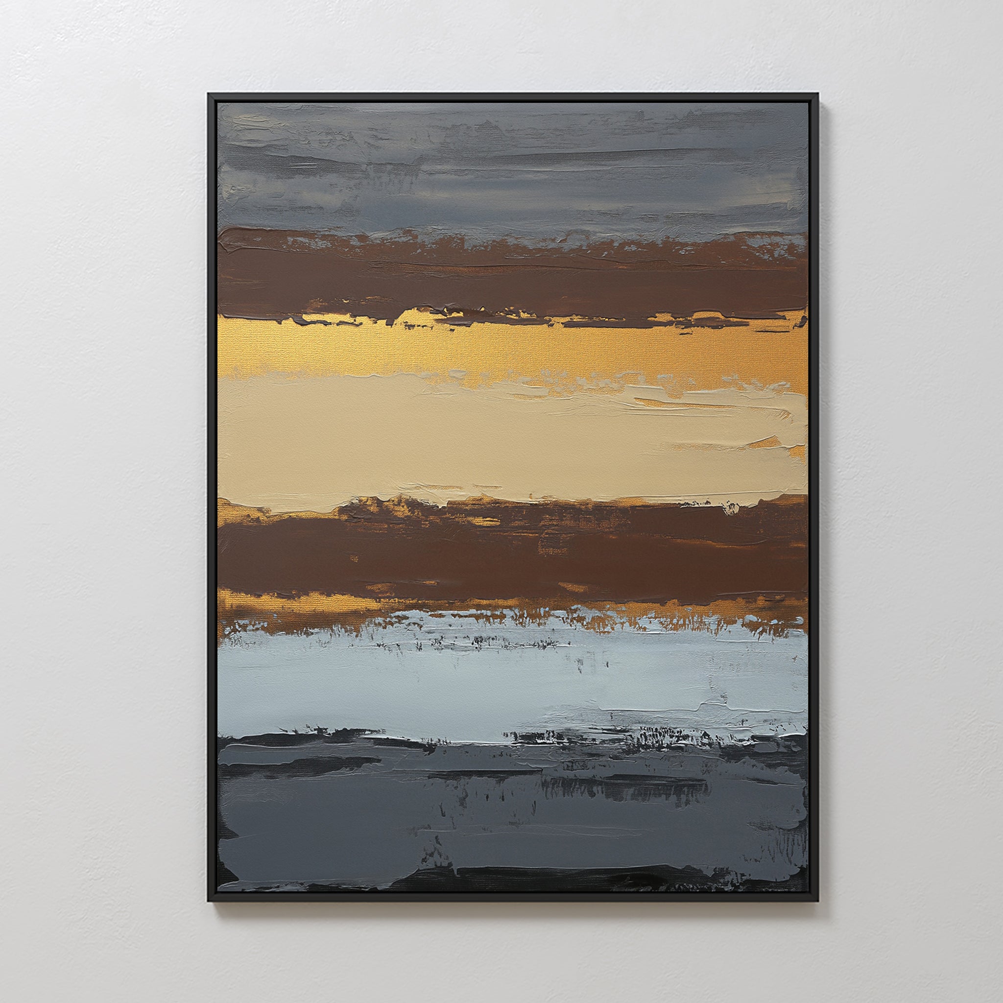 The Coastal Strata Canvas Art - Vertical features abstract bands of gray, brown, gold, beige, and blue with textured brushstrokes. Metallic gold accents add sophistication, and the contemporary print is elegantly framed in black.