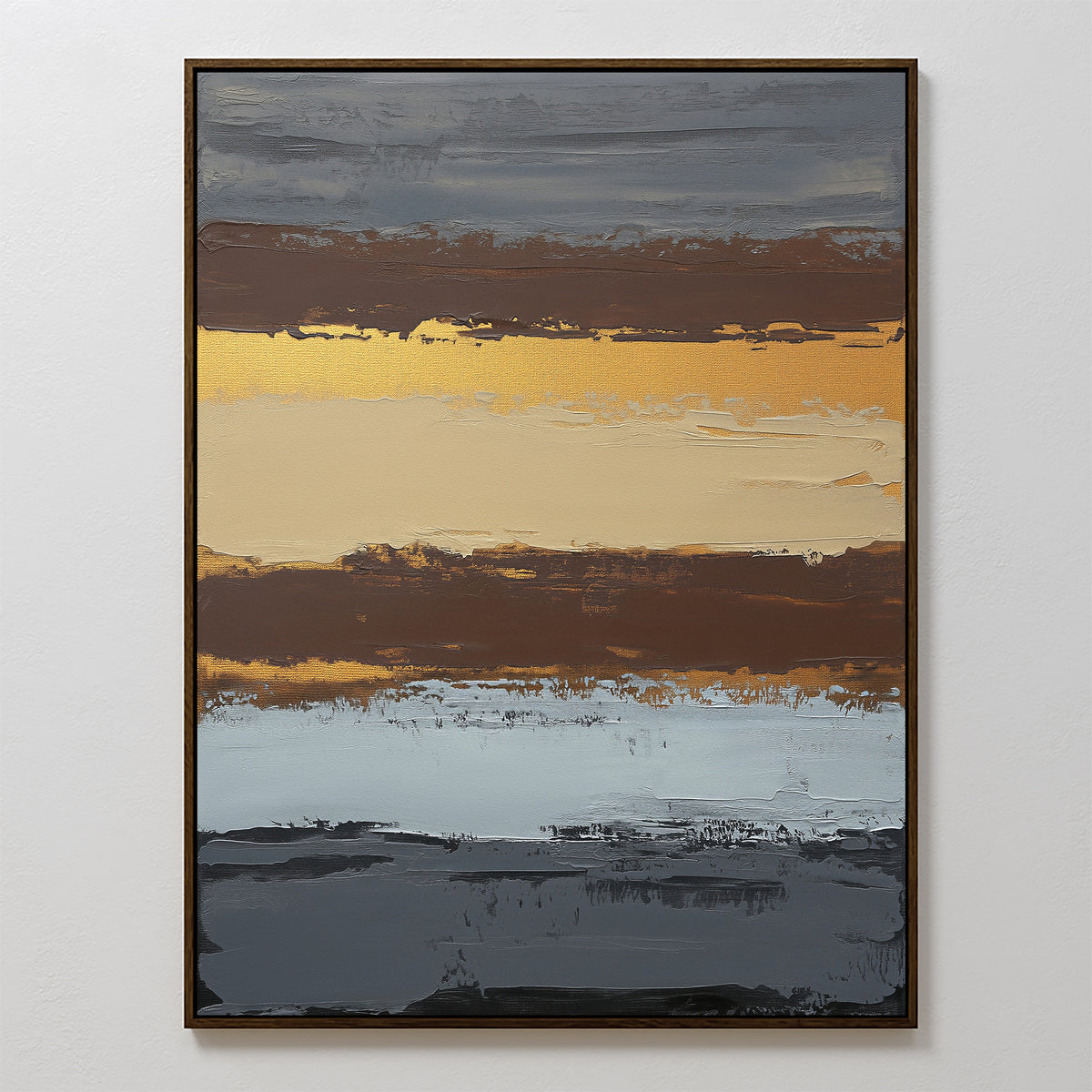 The Coastal Strata Canvas Art - Vertical features textured layers of gold, brown, beige, and gray in an abstract design. This framed contemporary print brings earthy sophistication to any space and looks stunning displayed on a white wall.
