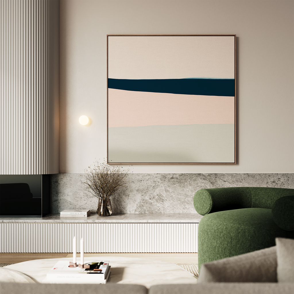 A modern living room featuring a green curved sofa, the Coastal Blend Abstract Canvas Art in pastel and dark hues, a marble shelf, dried flowers in a vase, and stacked books with candles—perfect for stylish modern décor.