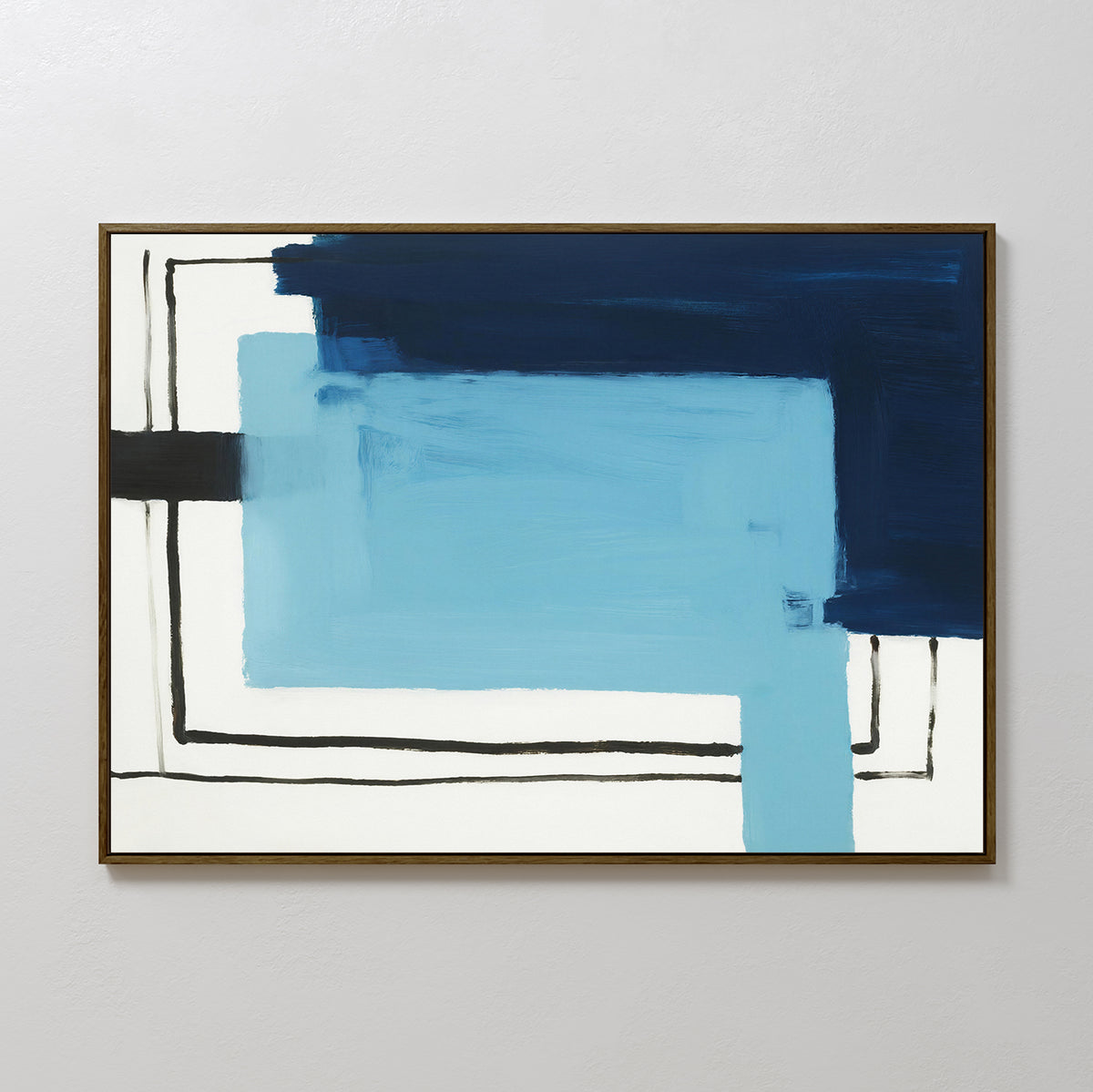 The Cobalt Intersection Canvas Art - Horizontal features overlapping dark and light blue rectangles, intersected by thin black lines on a white background. This geometric wall art is framed with a slim, dark border and displayed on a pale wall.