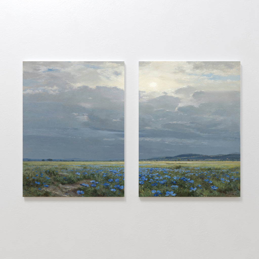Cornflower Fields - Set of 2: This pair of canvas paintings showcases a peaceful pastoral scene with cornflower fields under a cloudy sky, rolling distant hills, and gentle sunlight filtering through the clouds.
