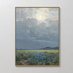 Cornflower Fields Canvas Art - Vertical features a framed painting of the sun breaking through clouds above wide cornflower fields and distant hills, creating a serene, peaceful atmosphere in this beautiful pastoral landscape.
