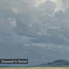 The Cornflower Fields Canvas Art - Vertical features a vast, cloudy sky in soft blue and gray hues above a distant pastoral landscape, with “Zoomed In Detail” text in the foreground.