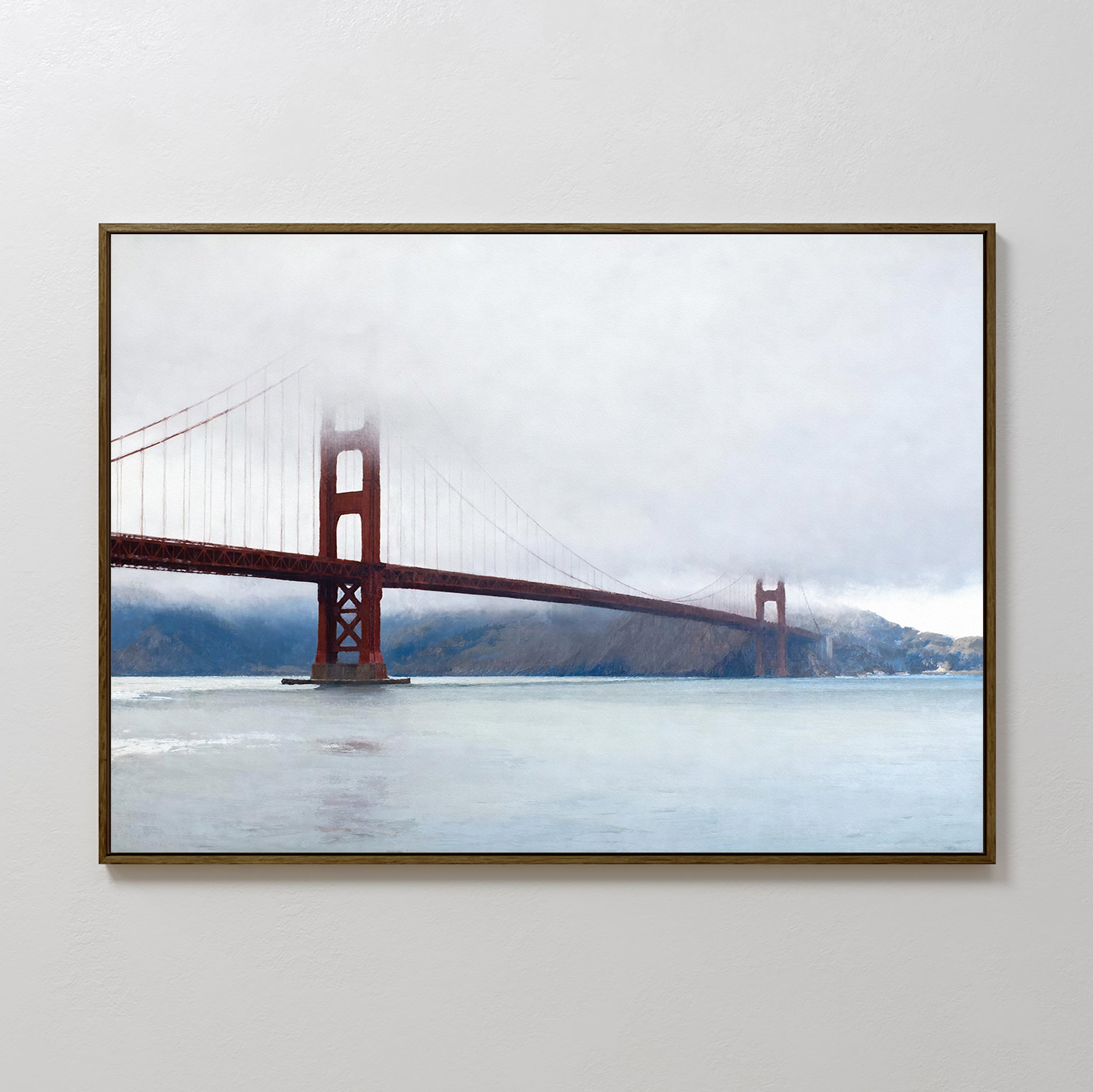 The Crimson Passage Canvas Art - Horizontal features the Golden Gate Bridge over water with hills and fog, bringing coastal elegance to any plain white wall.