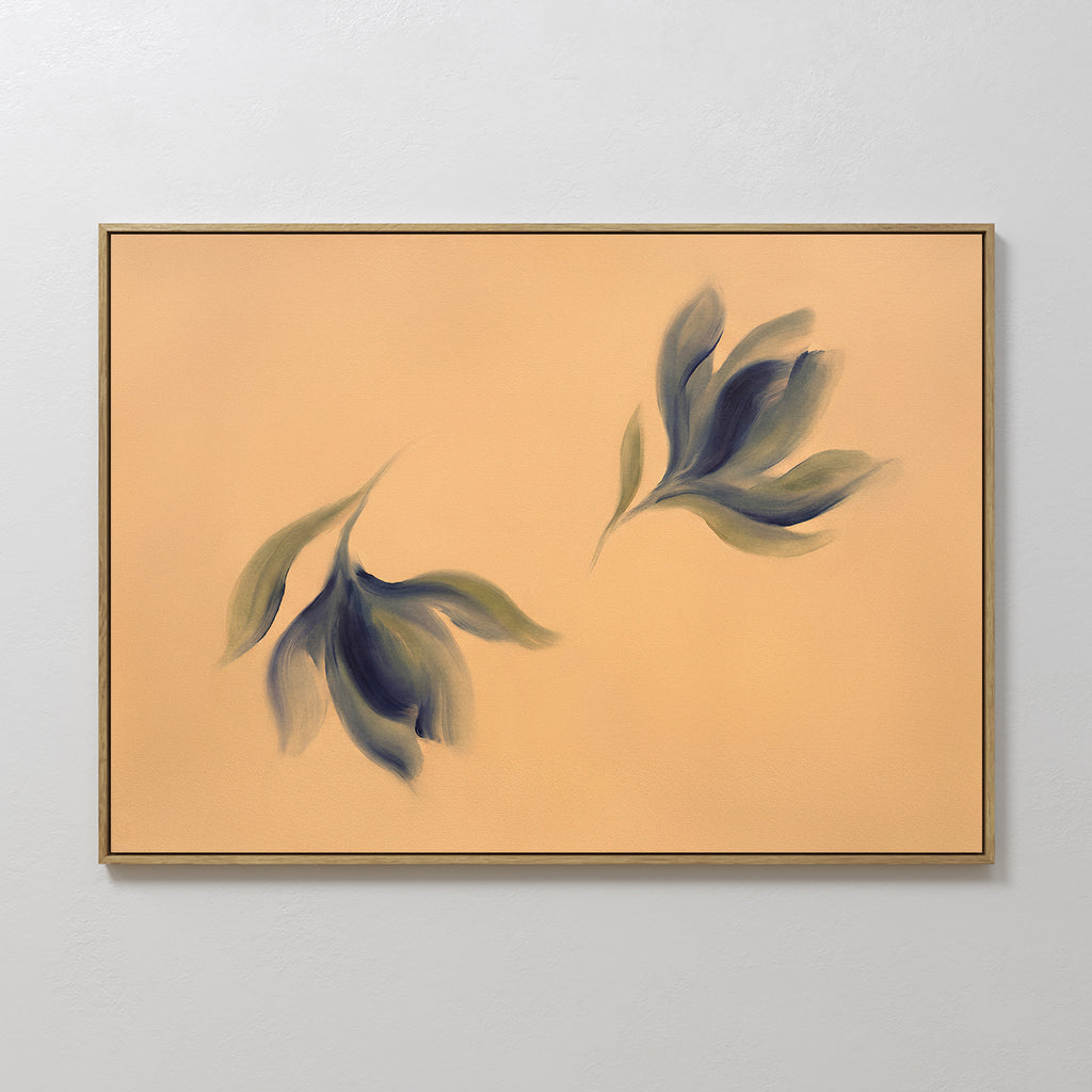 The Dancing Leaves Canvas Art - Horizontal showcases two abstract leaves in green and dark blue on a peach background, creating serene botanical wall decor perfect for any light gray wall.