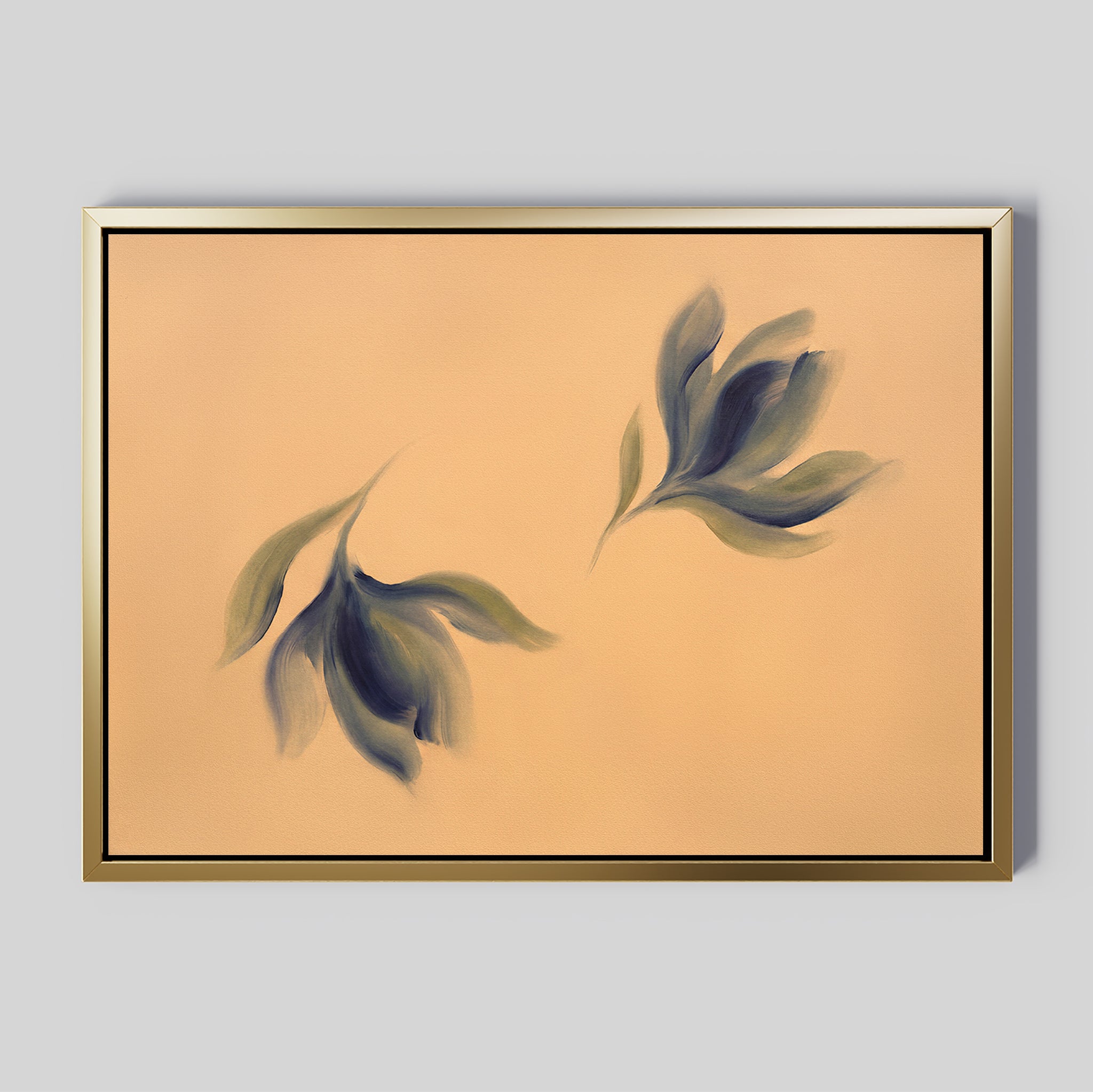 The Dancing Leaves Canvas Art - Horizontal features two abstract dark green leaves on a peach background with a gold frame and black inner border, making it perfect botanical wall art for a Nordic Park-inspired space.