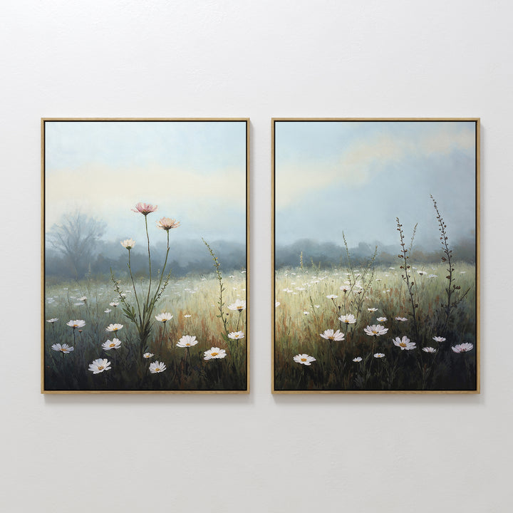 The "Dawn Meadow - Set of 2" features framed botanical prints of a wildflower field with white and pink blooms, tall grasses, and a misty backdrop, displayed side by side on a white wall.
