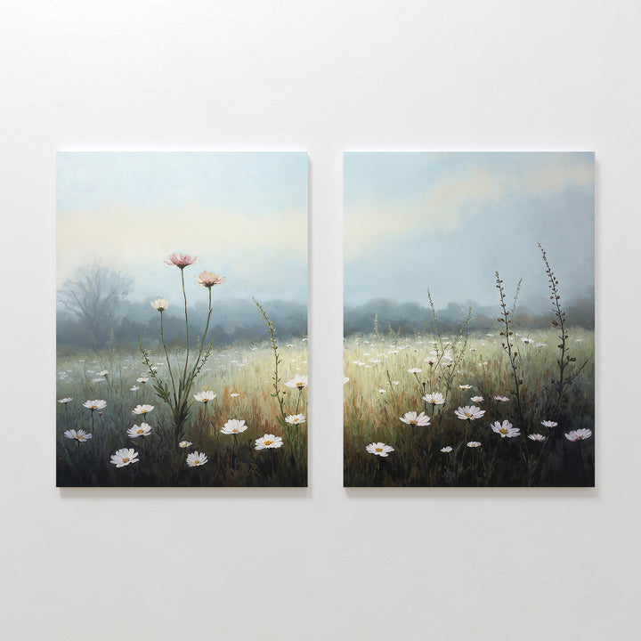 The Dawn Meadow - Set of 2 features serene canvas prints of wildflowers and daisies beneath a softly lit sky with hazy trees, perfect for adding a peaceful, Nordic Park-inspired botanical touch to your decor.