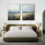 A modern bedroom with a green bed, white bedding, two beige nightstands with matching lamps, and the "Dawn Meadow - Set of 2" wildflower field art hanging above the bed.