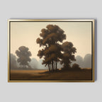 The Dawn Silhouettes Canvas Art - Horizontal showcases tall, brownish trees on a grassy field beneath a foggy sky, evoking Nordic park vibes. Set in a gold frame, it adds tranquility to any plain gray wall.
