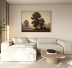A modern living room with a light beige sectional sofa, a low round wooden coffee table, and the Dawn Silhouettes Canvas Art - Horizontal on the wall. Soft natural light enters through a window with sheer curtains.