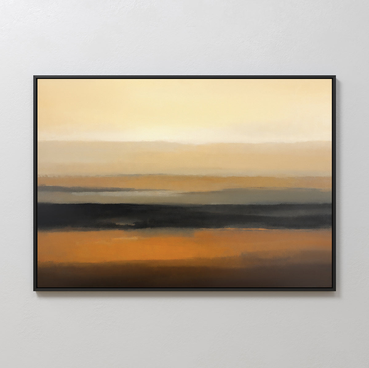 The Desert Mirage Canvas Art - Horizontal features soft, blurred bands of beige, gold, orange, and dark brown to evoke a serene desert landscape, framed simply in black and displayed on a light wall.