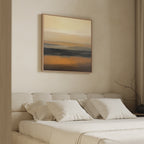 A modern bedroom features a beige upholstered bed with white bedding and neutral pillows. Above the bed hangs the Desert Mirage Canvas Art - Square in warm earth tones, creating a Nordic Park-inspired look in soft natural light.