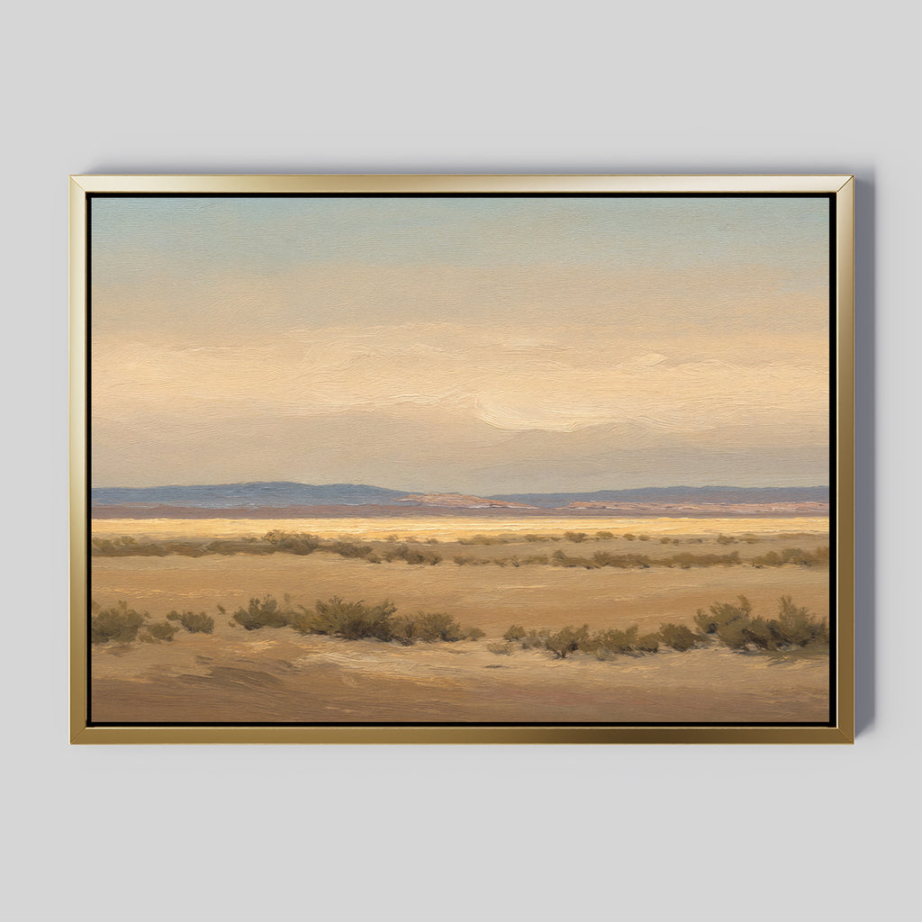 Desert Solitude Canvas Art - Horizontal features a serene desert landscape with sparse bushes, wide plains, distant mountains, and a soft cloudy sky—ideal as tranquil wall decor against a plain gray background.