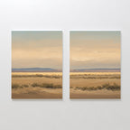 Desert Solitude - Set of 2 features two canvas paintings depicting a serene southwestern landscape in beige, brown, and blue hues with dry grass and distant hills, ideal as calming wall decor.