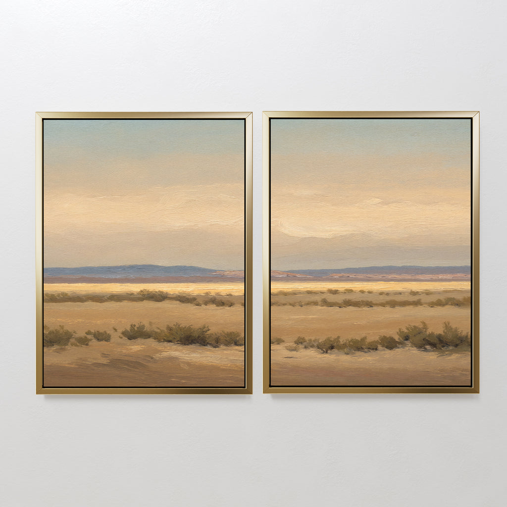 Desert Solitude - Set of 2 features southwestern landscape art with dry grass, distant hills, and a cloudy sky in earth tones, creating serene wall decor on a plain white wall.
