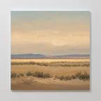 Desert Solitude Canvas Art - Square features a painted southwestern landscape with flat desert, low shrubs, distant hills, and a soft, cloudy sky in beige and blue—ideal serene wall decor for a calm, expansive atmosphere.