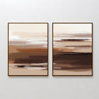 Desert Winds - Set Of 2 features abstract prints with horizontal brushstrokes in brown, beige, and white earth tones. Displayed side by side in frames on a white wall, they create a modern Nordic Park-inspired look.