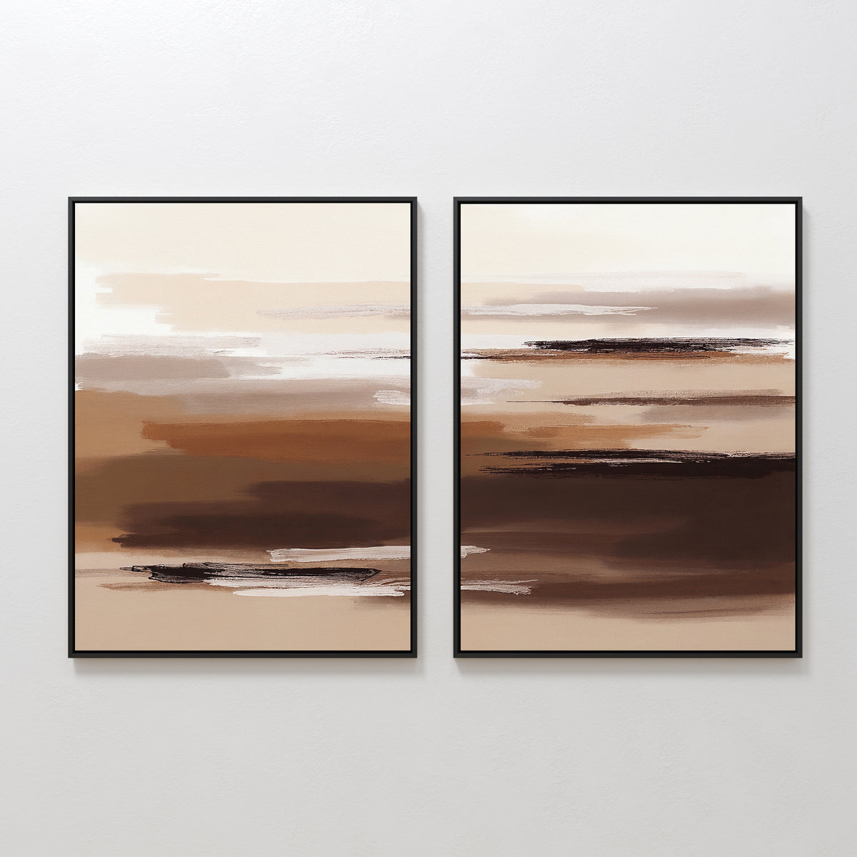 The Desert Winds - Set Of 2 features abstract prints with horizontal brushstrokes in brown, beige, and cream with black accents. Displayed on a white wall, this minimalist artwork adds subtle elegance to any space.