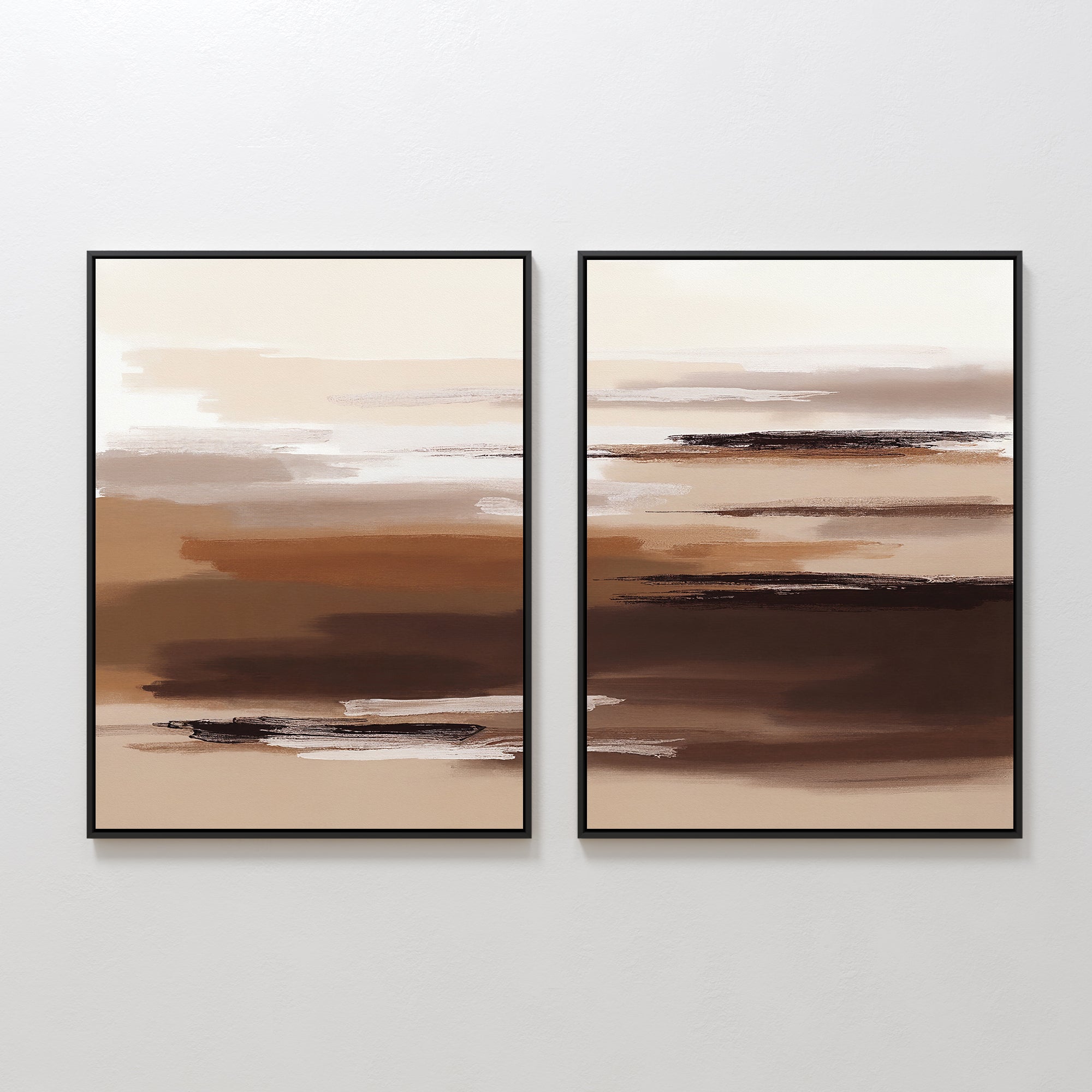 The Desert Winds - Set Of 2 features abstract prints with horizontal brushstrokes in brown, beige, and cream with black accents. Displayed on a white wall, this minimalist artwork adds subtle elegance to any space.
