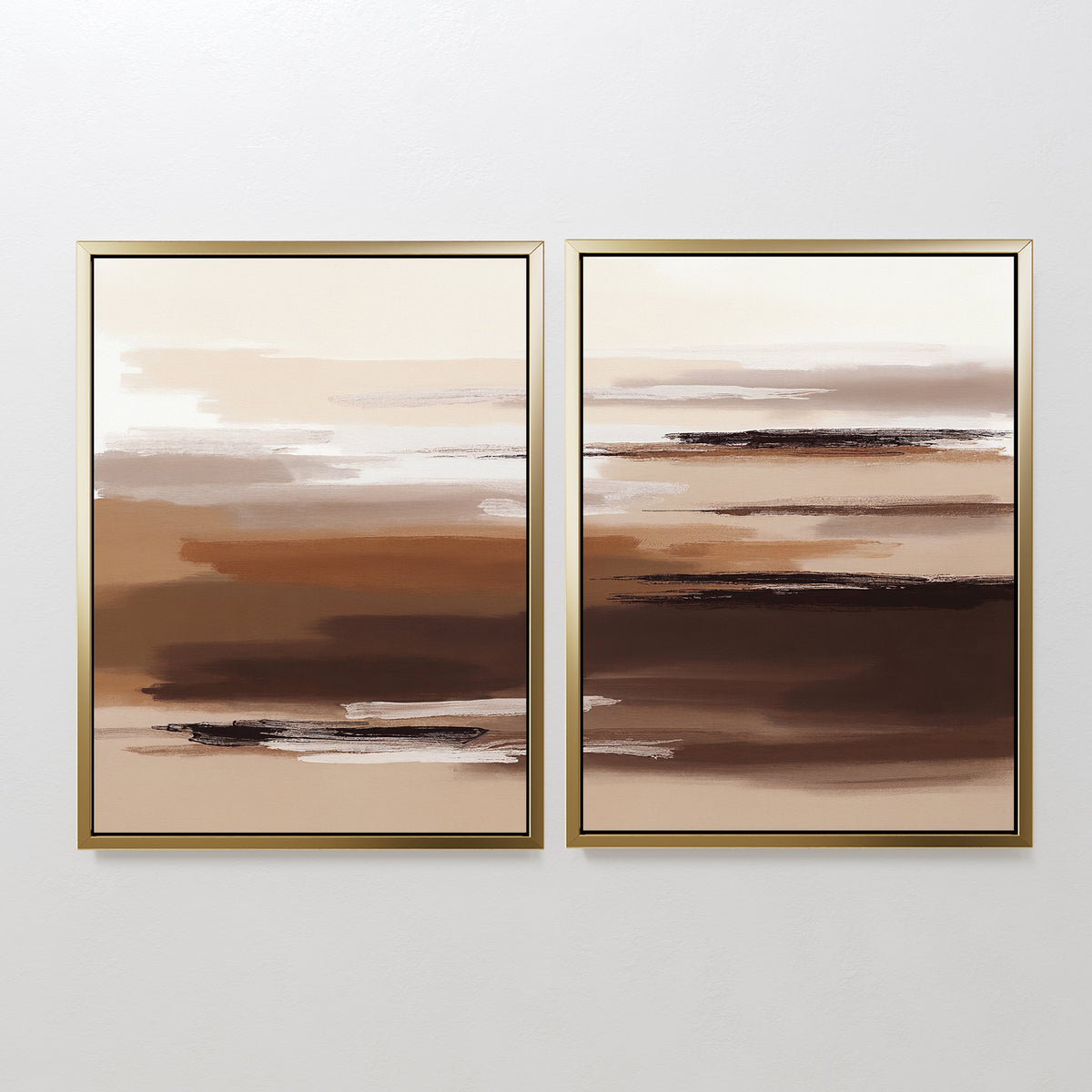 The Desert Winds - Set Of 2 features framed abstract prints with horizontal brushstrokes in calming earth tones, bringing a serene Nordic Park landscape vibe to any white wall.