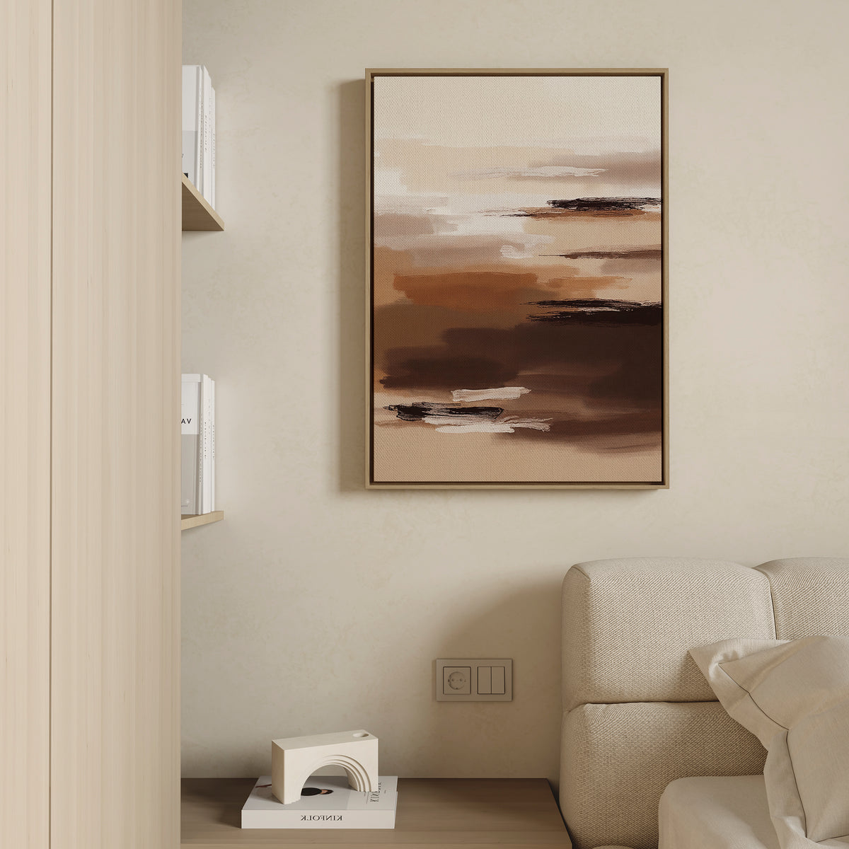 A modern living room corner with a beige sofa, built-in shelves, a geometric white sculpture, and the Desert Winds Canvas Art - Vertical in earth tones on a cream wall evokes Nordic Park style.