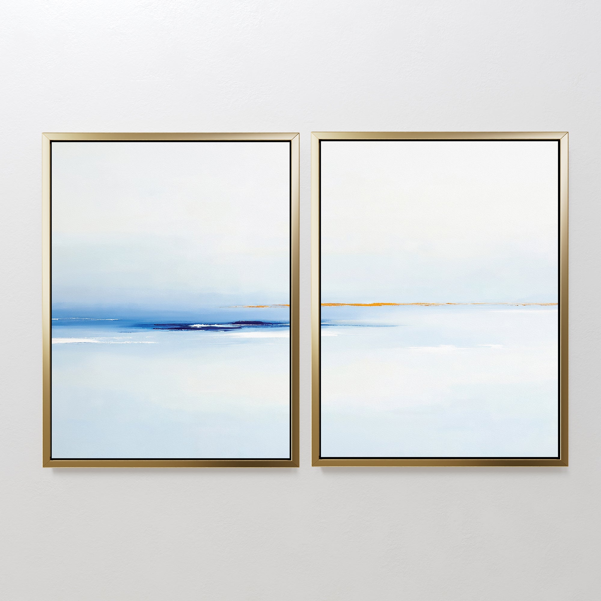 The Distant Archipelago - Set Of 2 features framed abstract prints in soft blue, white, and ochre, evoking a tranquil seascape. This contemporary wall art is perfect for adding minimalist Nordic Park-inspired style to your space.