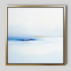 The Distant Archipelago Canvas Art - Square features soft white and pale blue gradients with faint gold and dark blue accents in a gold frame, evoking a serene seascape—perfect for a Nordic Park-inspired space.