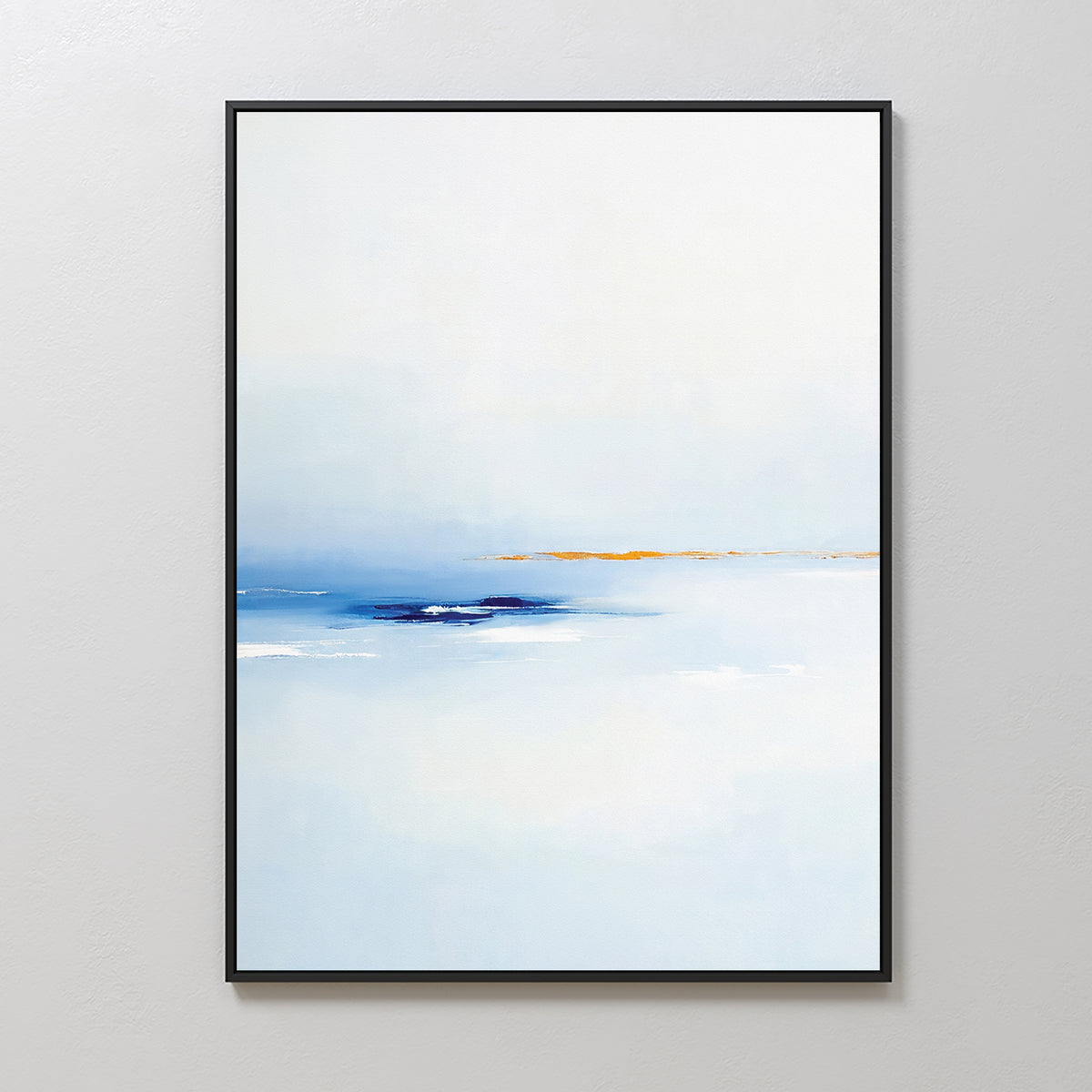 The Distant Archipelago Canvas Art - Vertical features minimalist wall art with a mostly white background, soft blue gradient at the bottom, and a thin orange-yellow line across the middle, framed in black and shown on a light-colored wall.