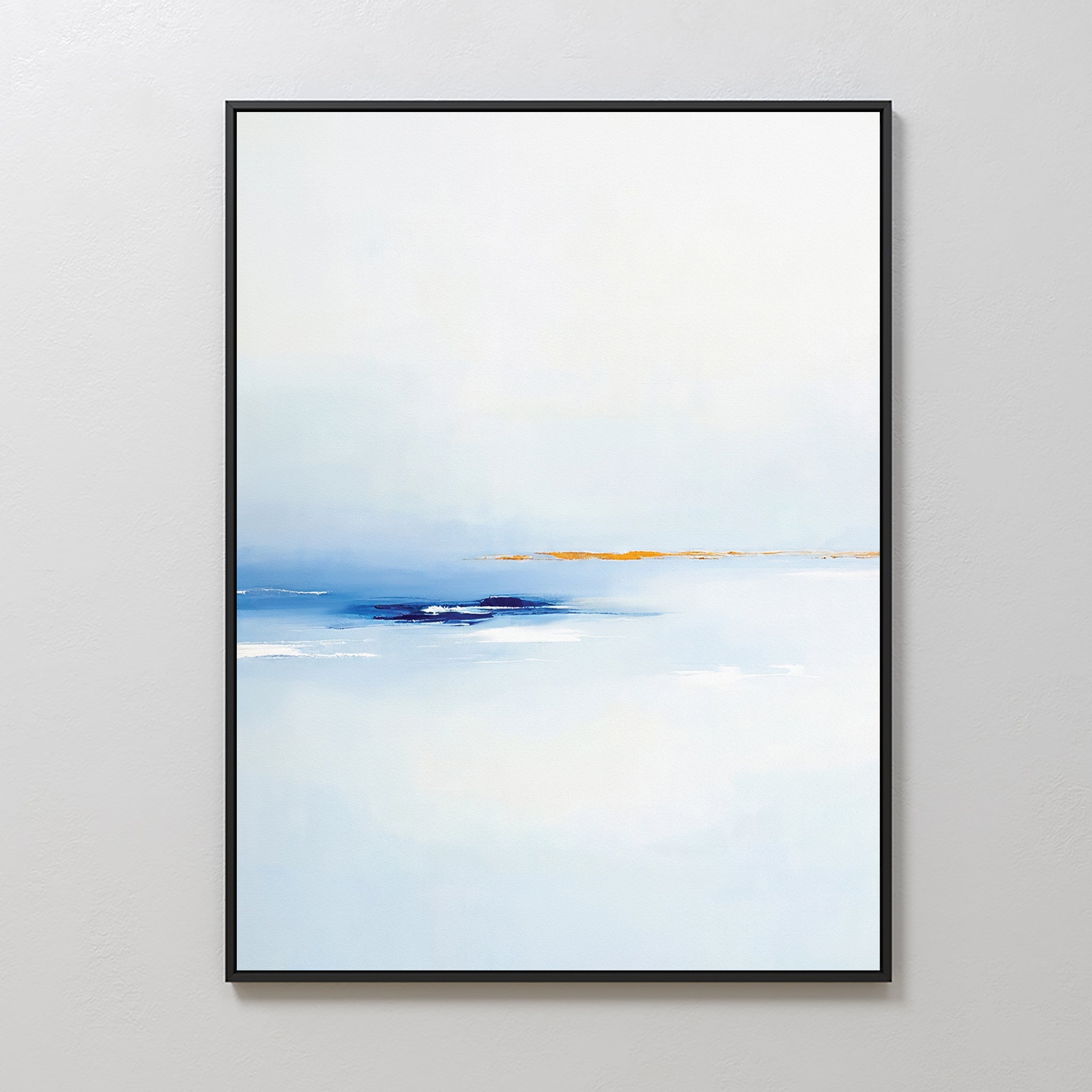 The Distant Archipelago Canvas Art - Vertical features minimalist wall art with a mostly white background, soft blue gradient at the bottom, and a thin orange-yellow line across the middle, framed in black and shown on a light-colored wall.