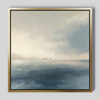 The Distant Isles Canvas Art - Square features a serene seascape with gentle waves, misty mountains, and two rocky islands beneath a cloudy sky in soft, muted colors.