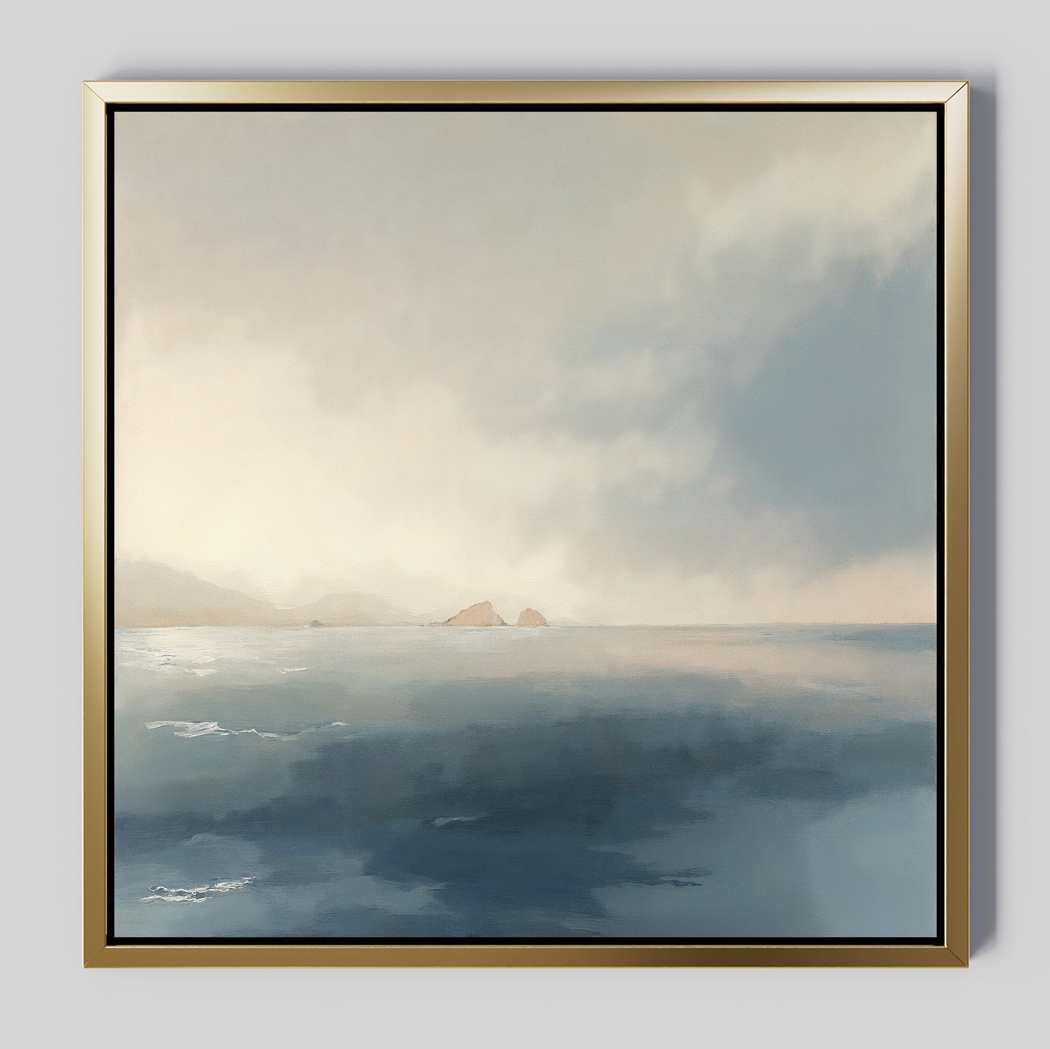 The Distant Isles Canvas Art - Square features a serene seascape with gentle waves, misty mountains, and two rocky islands beneath a cloudy sky in soft, muted colors.