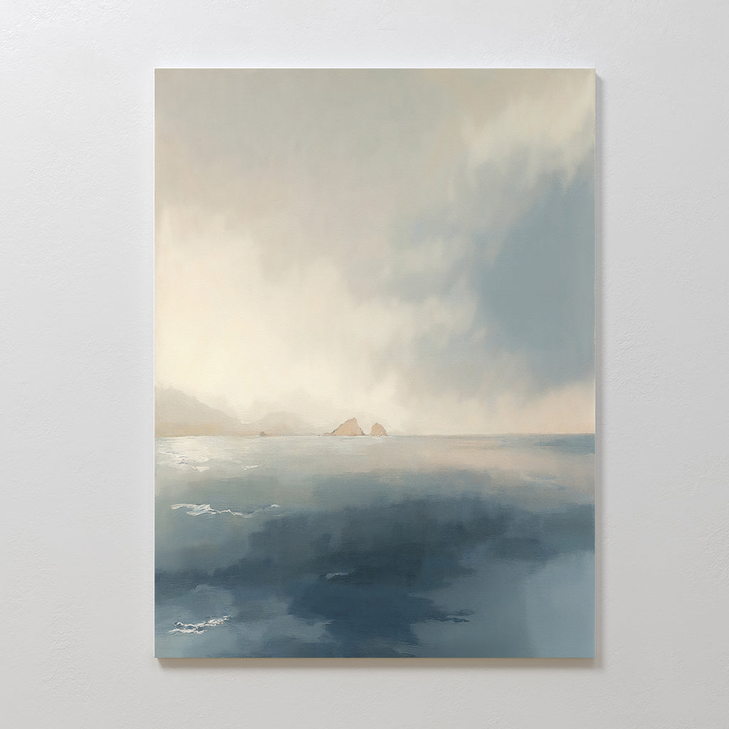 The Distant Isles Canvas Art - Vertical features a tranquil seascape with rocky islands, soft blue water, and a luminous cloudy sky, adding minimalist serenity and peaceful style to any space.