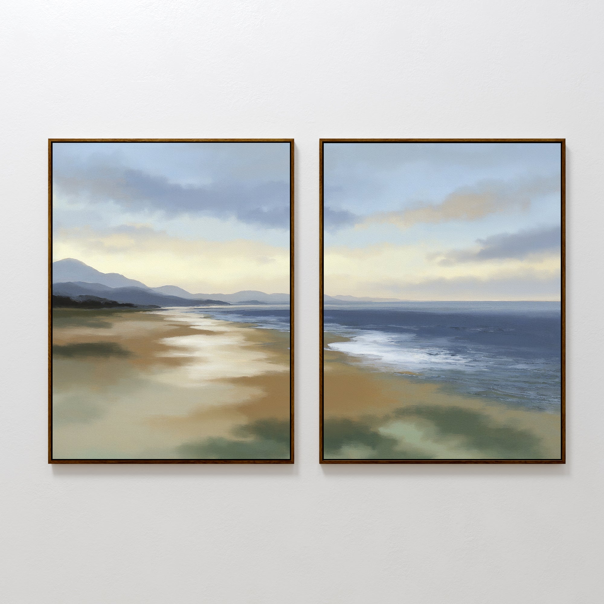 The Distant Shores - Set of 2 features framed paintings of a serene coastal panorama with a sandy beach, calm sea, and distant hills under a softly lit, cloudy sky.