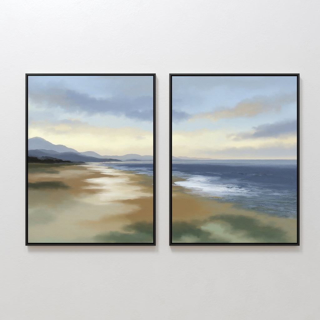 The "Distant Shores - Set of 2" features framed canvas prints of a serene coastal panorama with sandy shores, gentle waves, and distant mountains in muted tones, displayed side by side on a white wall.