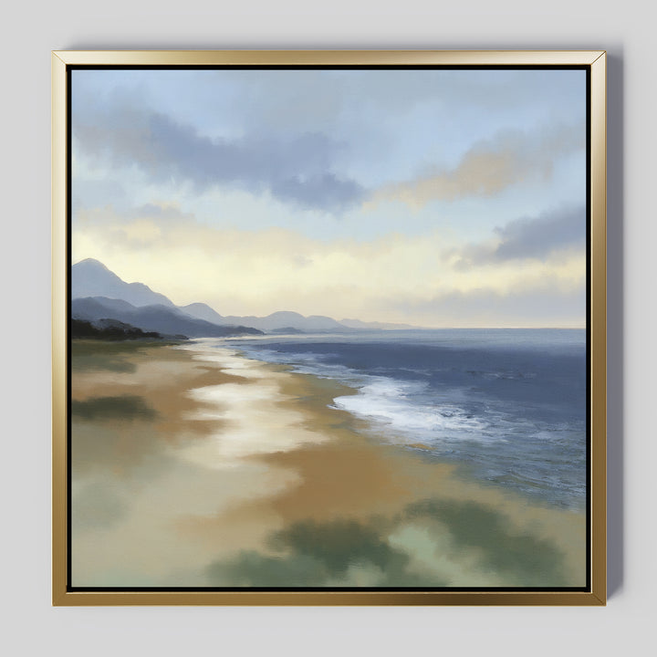 The Distant Shores Canvas Art - Square features a serene beach scene with gentle waves, sandy shore, distant mountains, and a cloudy sky in soft, muted colors—beautifully framed for your space.