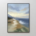 The Distant Shores Canvas Art - Vertical is a framed print featuring a serene coastal panorama with gentle waves, sandy shore, distant mountains, and a cloudy sky reflecting soft light.