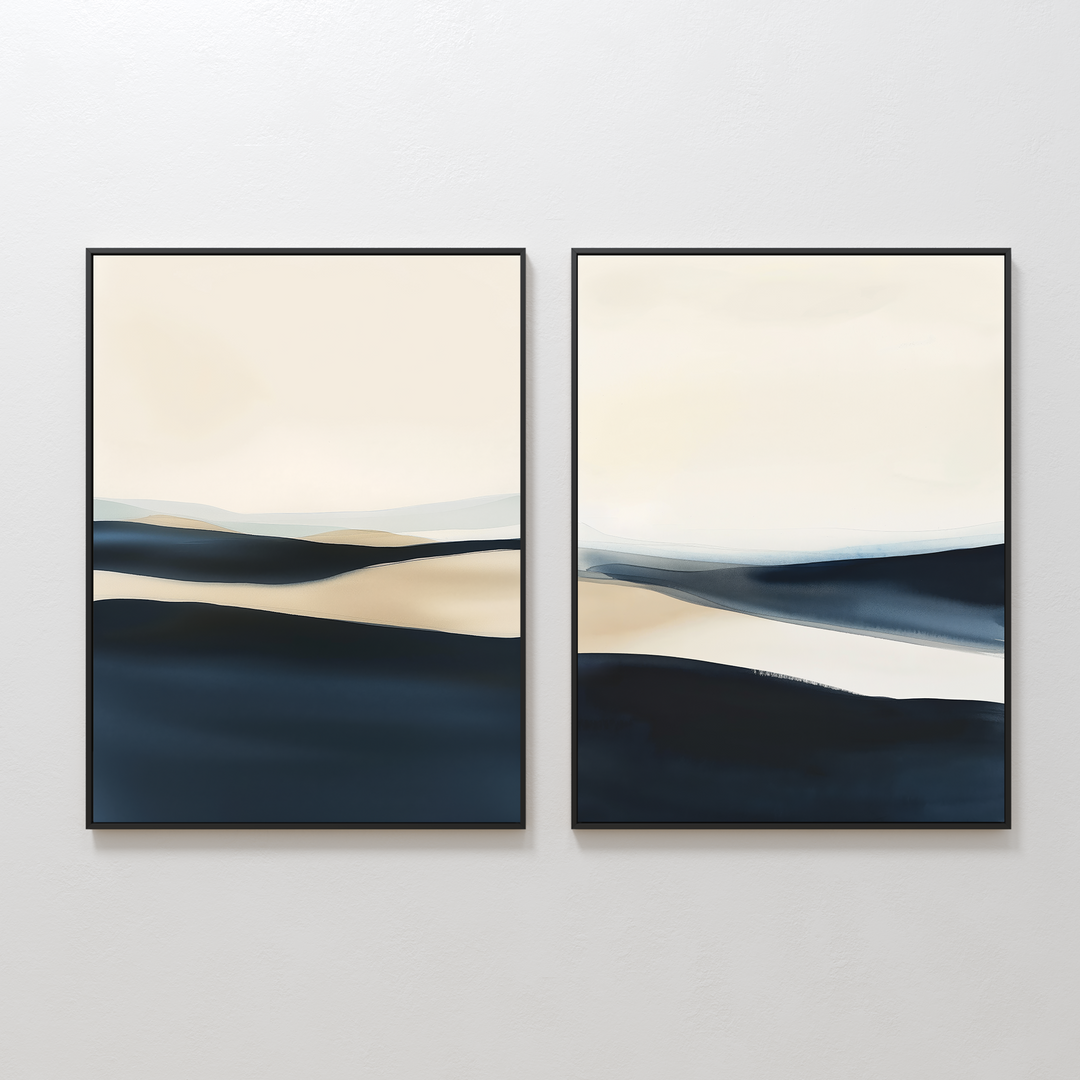 The Twilight Horizons Set of 2 features minimalist abstract paintings with soft navy, beige, and cream shapes. Hung side by side on a white wall, they create a serene landscape-inspired look.