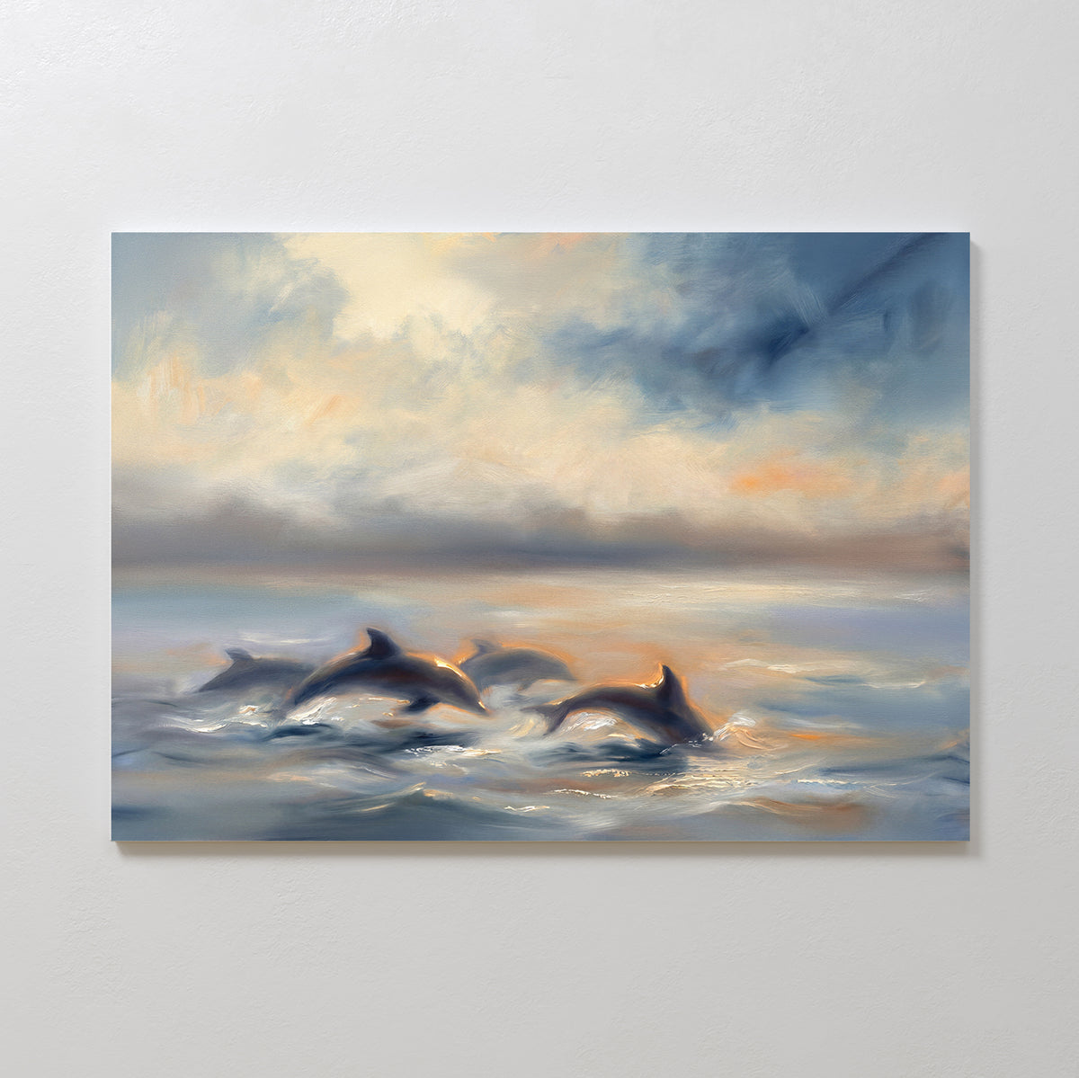 Dolphin Pod at Sunset Canvas Art - Horizontal features dolphins swimming together at sunset with gentle waves in soft blue, orange, and yellow—an ideal serene wall art print for coastal wall decor.