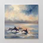 The Dolphin Pod at Sunset Canvas Art - Square features dolphins swimming in the ocean with soft, dreamy colors and a glowing sky. This wall art brings a tranquil, ethereal vibe to your space, adding a touch of serenity to any room.