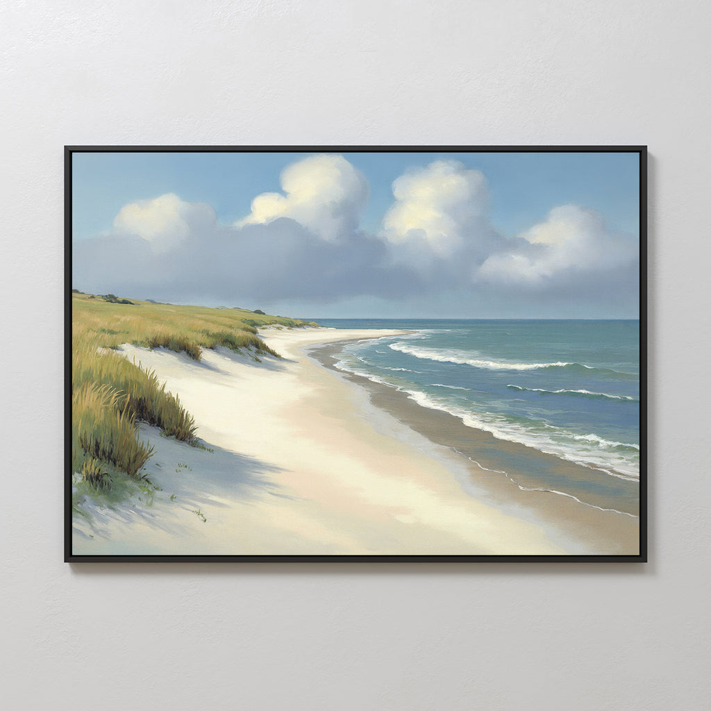 The Dune Whispers Canvas Art - Horizontal showcases a sandy beach with grassy dunes, gentle waves, and a blue sky with clouds, adding serene coastal charm to any space when hung on a plain white wall.