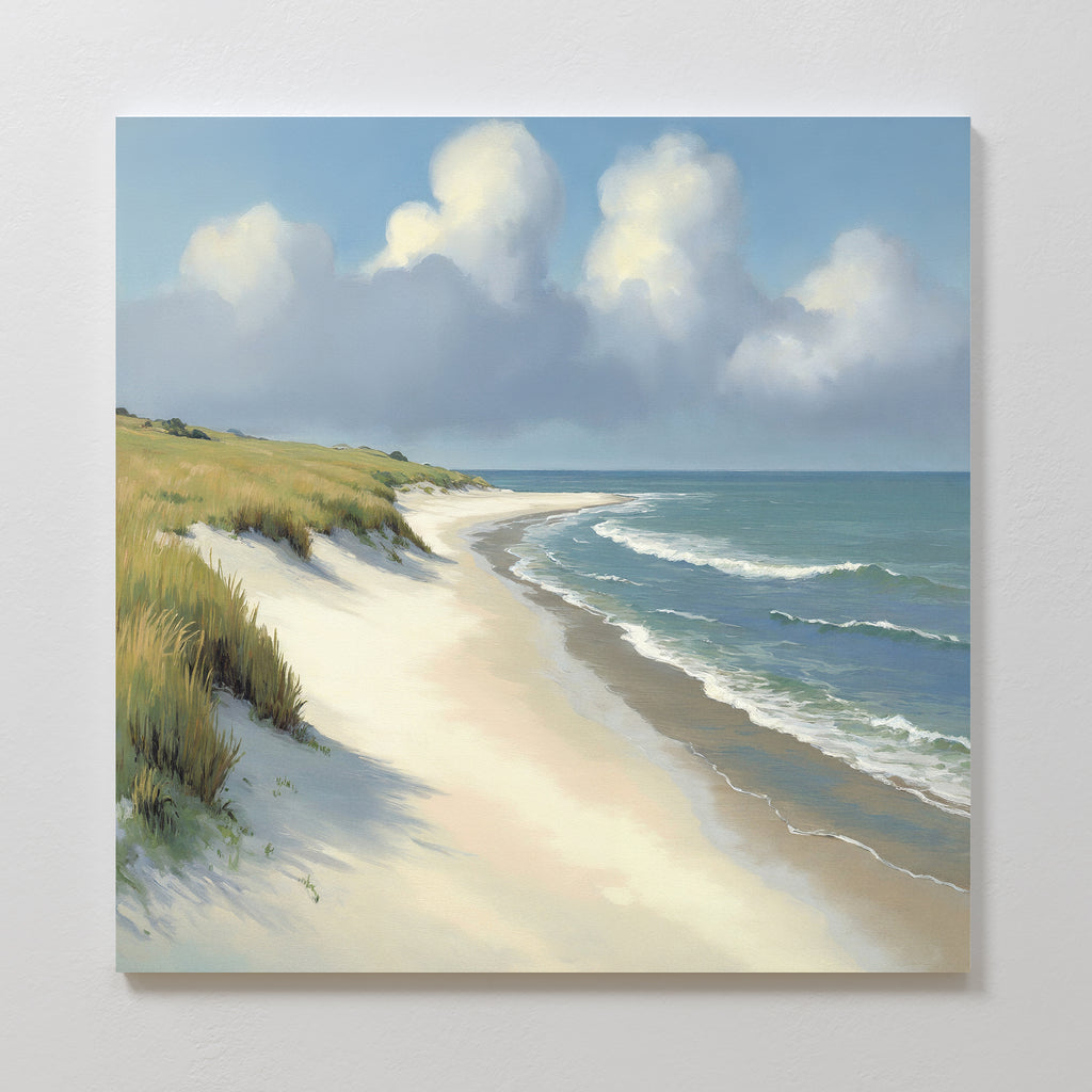 The Dune Whispers Canvas Art - Square features a tranquil beach scene with gentle waves, sandy shore, green grasses, and a blue sky with white clouds. Its curving coastline creates a peaceful, inviting coastal landscape.