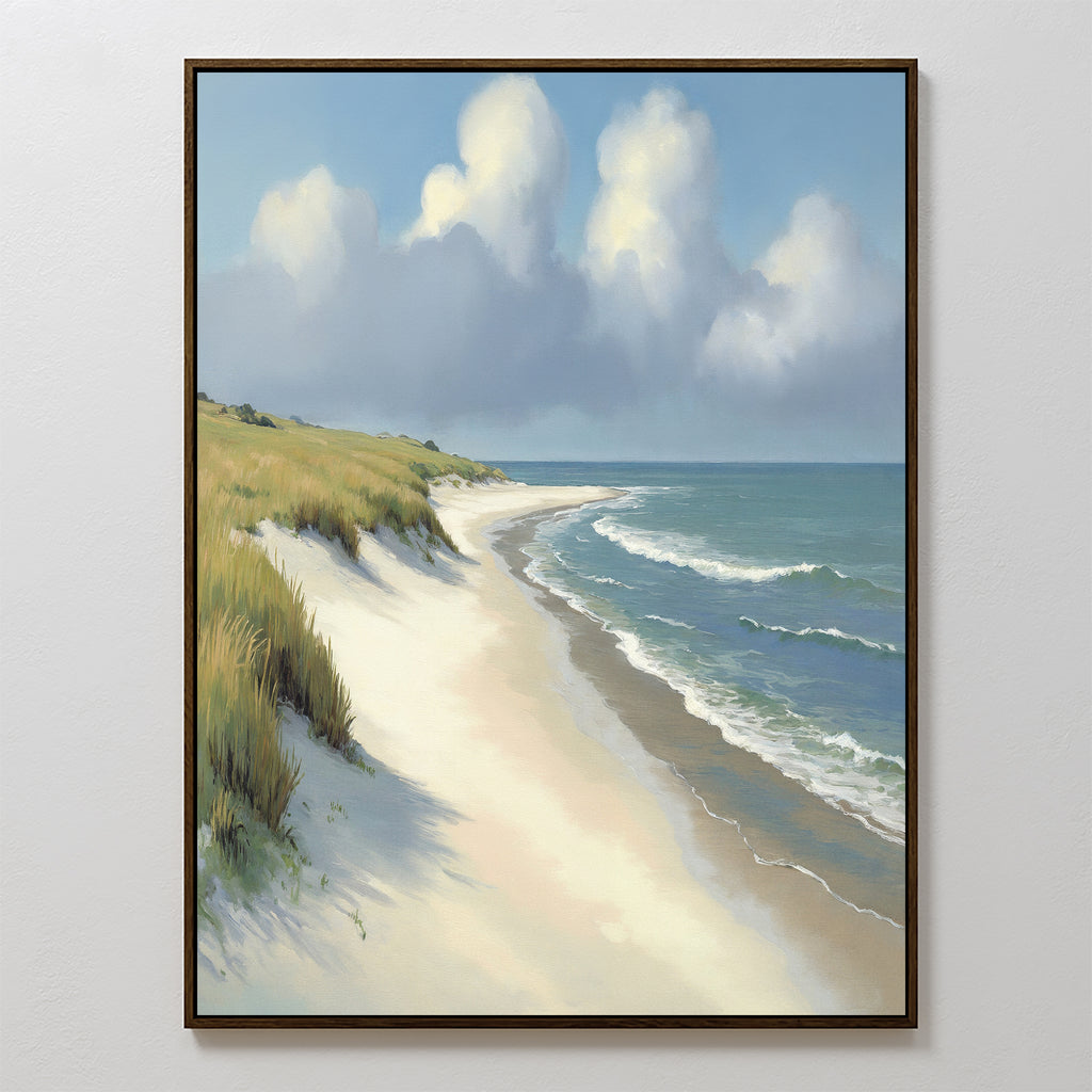 The Dune Whispers Canvas Art - Vertical features a tranquil sandy beach with gentle waves, grassy dunes to the left, and a blue sky dotted with fluffy clouds, beautifully capturing serene coastal scenery.