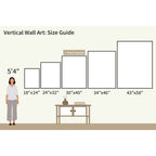 Minimalist wall art size guide featuring Noir Botanica Canvas Art in frames (18x24, 24x32, 30x40 most popular, 34x46, 43x58) above a console table with modern decor and abstract accents, shown next to a 5’4” person.