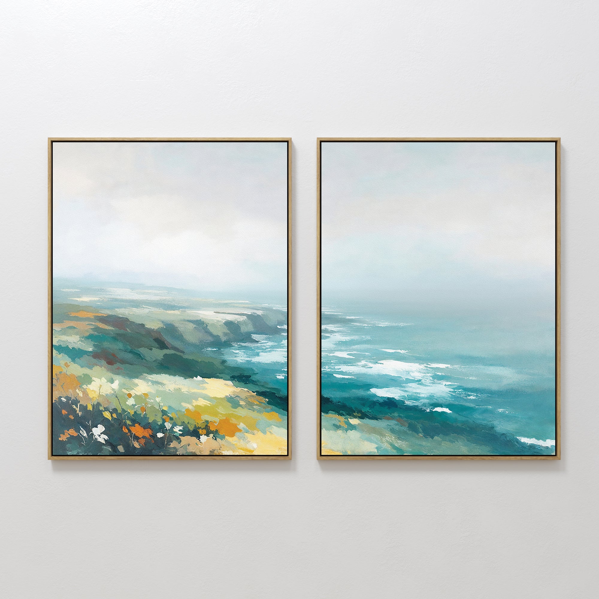 The "Emerald Cliffs - Set of 2" features framed canvas prints side by side, showing an abstract coastal landscape with emerald cliffs, blue ocean waves, and yellow highlights beneath a cloudy sky in soft, muted tones.