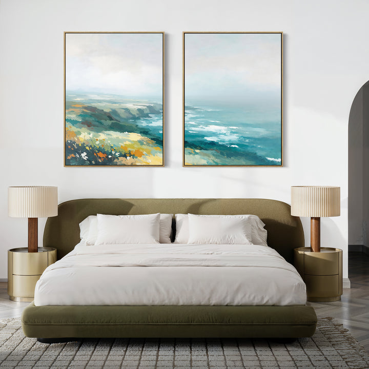 A modern bedroom with an olive-green bed, white bedding, beige nightstands with matching lamps, and the Emerald Cliffs - Set of 2 coastal landscape canvas prints above the bed. A textured rug covers the floor.