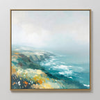 The Emerald Cliffs Canvas Art - Square features a framed coastal landscape with wildflowers and ocean waves beneath a misty sky, painted in soft blue, green, yellow, and white brushstrokes.