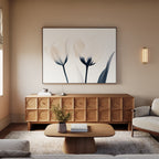 A modern living room with a wooden sideboard, minimal coffee table, light sofa, and the Ethereal Blooms Canvas Art - Horizontal as floral decor—Nordic Park style—plus small decor and a wall sconce in neutral earthy tones.