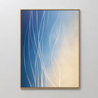Ethereal Lines Canvas Art - Vertical features a gradient backdrop from deep blue to light cream with wavy white lines. Elegantly gold-framed, it adds a modern Nordic Park touch to living rooms as stylish wall decor.