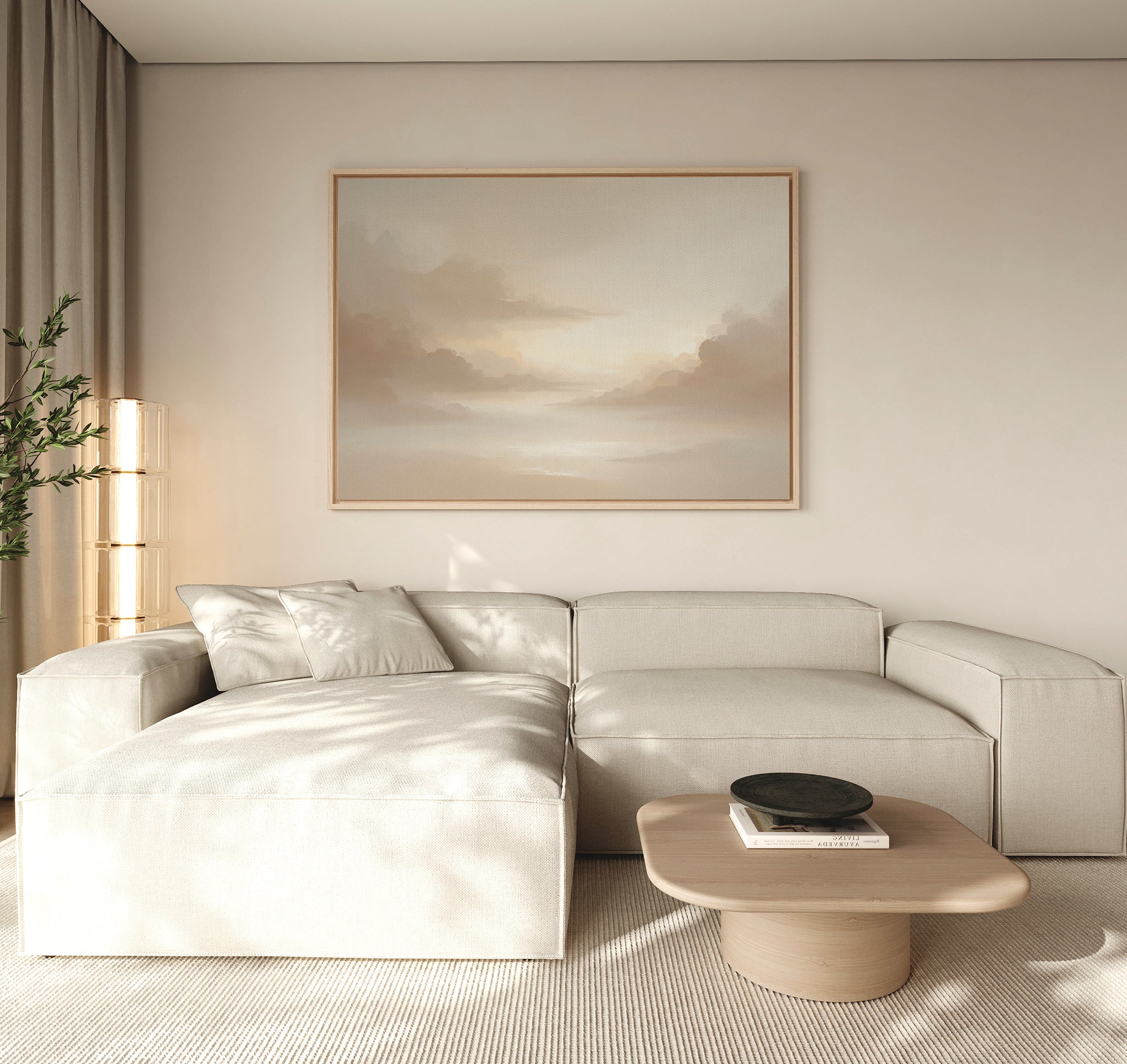A modern living room features a light beige sectional sofa, a light wood coffee table, and the Ethereal Veil Canvas Art - Horizontal—a serene print of soft, cloudy skies. Neutral tones and gentle natural light complete the tranquil atmosphere.